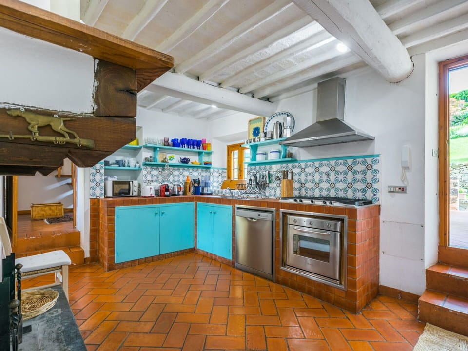 Cabinetry, Countertop, Kitchen, Kitchen Appliance, Building, Wood, Interior Design, Flooring, Kitchen Stove, Home Appliance
