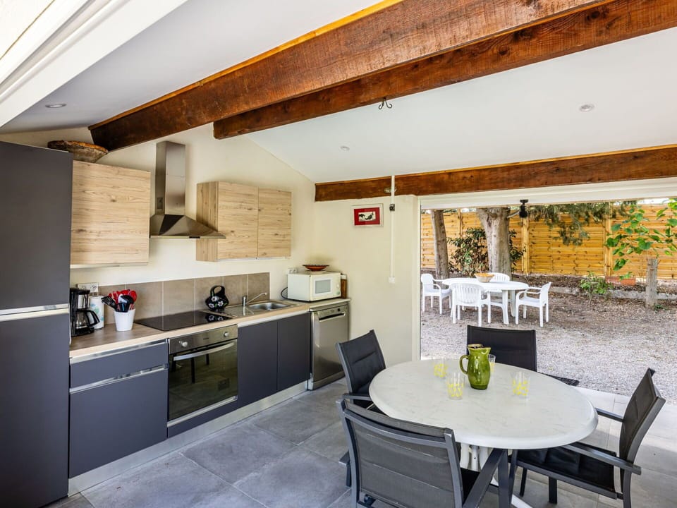 Furniture, Property, Cabinetry, Plant, Table, Countertop, Chair, Lighting, Interior Design, Architecture