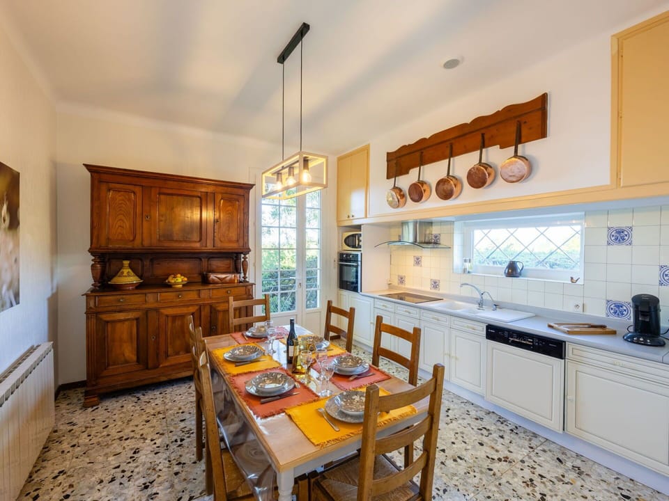 Countertop, Cabinetry, Table, Furniture, Wood, Kitchen, Sink, Chair, Interior Design, Drawer
