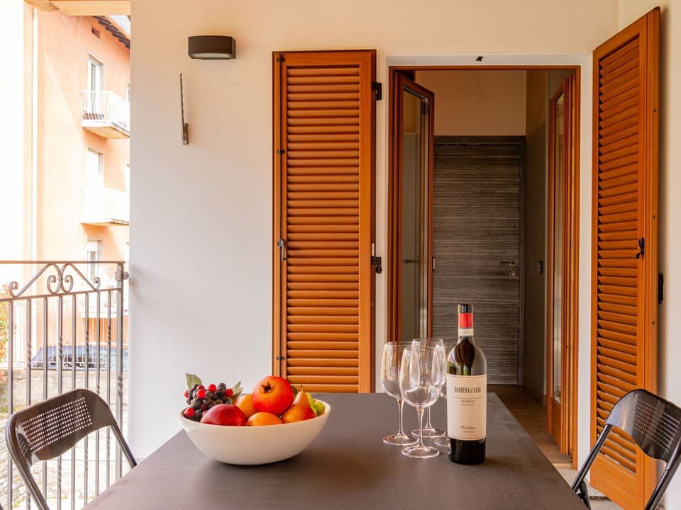 Building, Property, Tableware, Table, Food, Bottle, Orange, Wood, Interior Design, Door