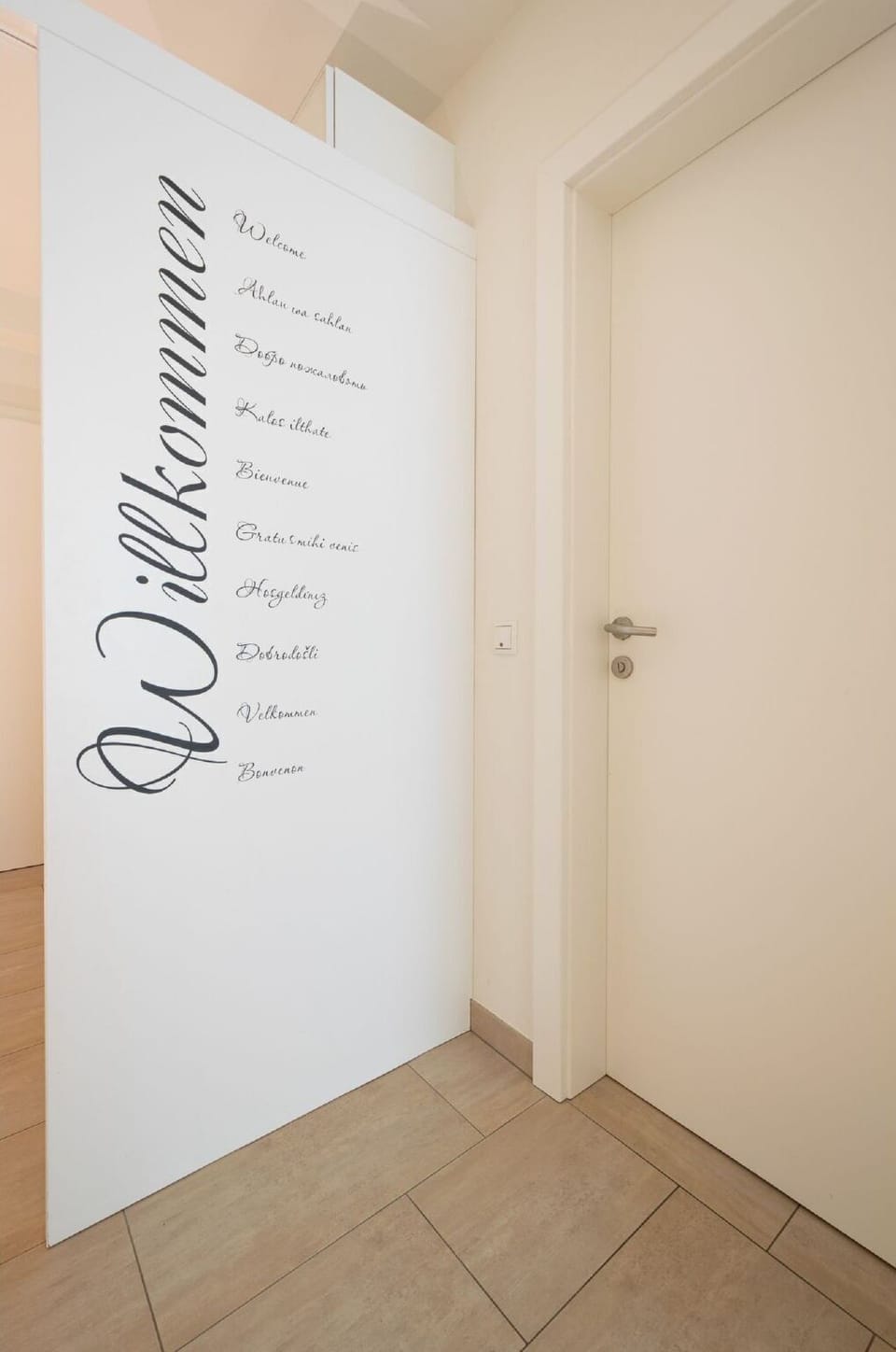 Wood, Art, Flooring, Floor, Wall, Font, Hardwood, Door
