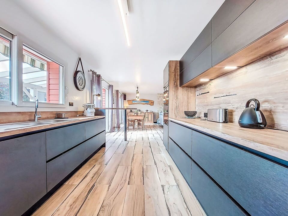 Flooring, Wood, Countertop, Interior Design, Kitchen, Floor, Cabinetry, Wood Flooring, Furniture, Hardwood