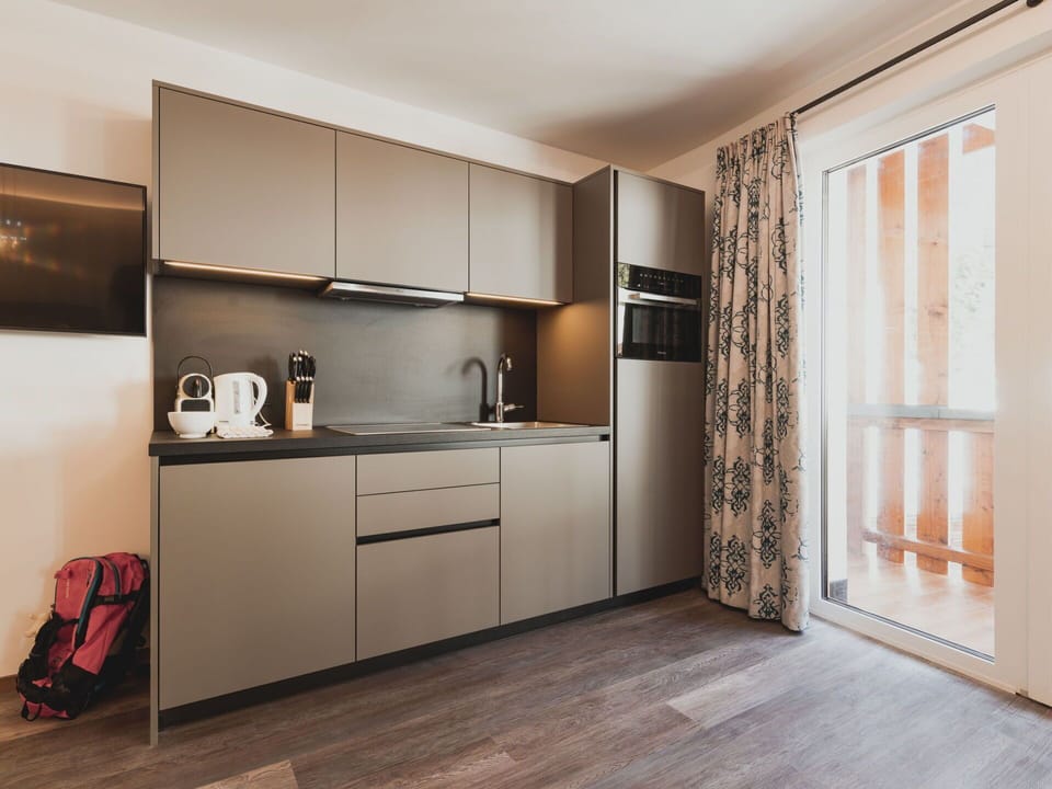 Cabinetry, Countertop, Wood, Building, Interior Design, Floor, Flooring, Home Appliance, Window, Material Property