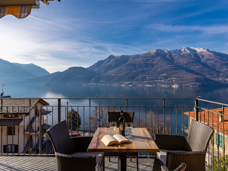 Cloud, Sky, Mountain, Water, Furniture, Azure, Table, Building, Fence, Lake