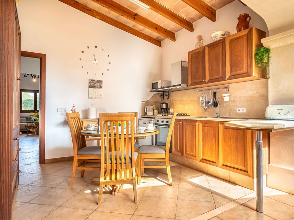 Furniture, Property, Cabinetry, Countertop, Table, Wood, Chair, Kitchen, Flooring, Wood Stain
