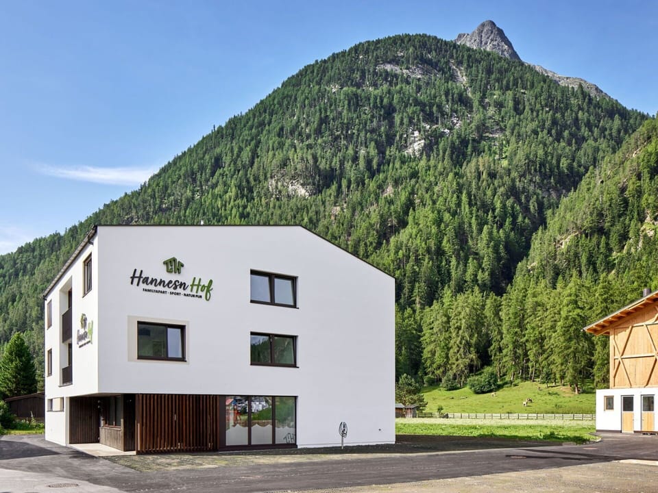 Sky, Mountain, Building, Window, Tree, Plant, Slope, Land Lot, Natural Landscape, House