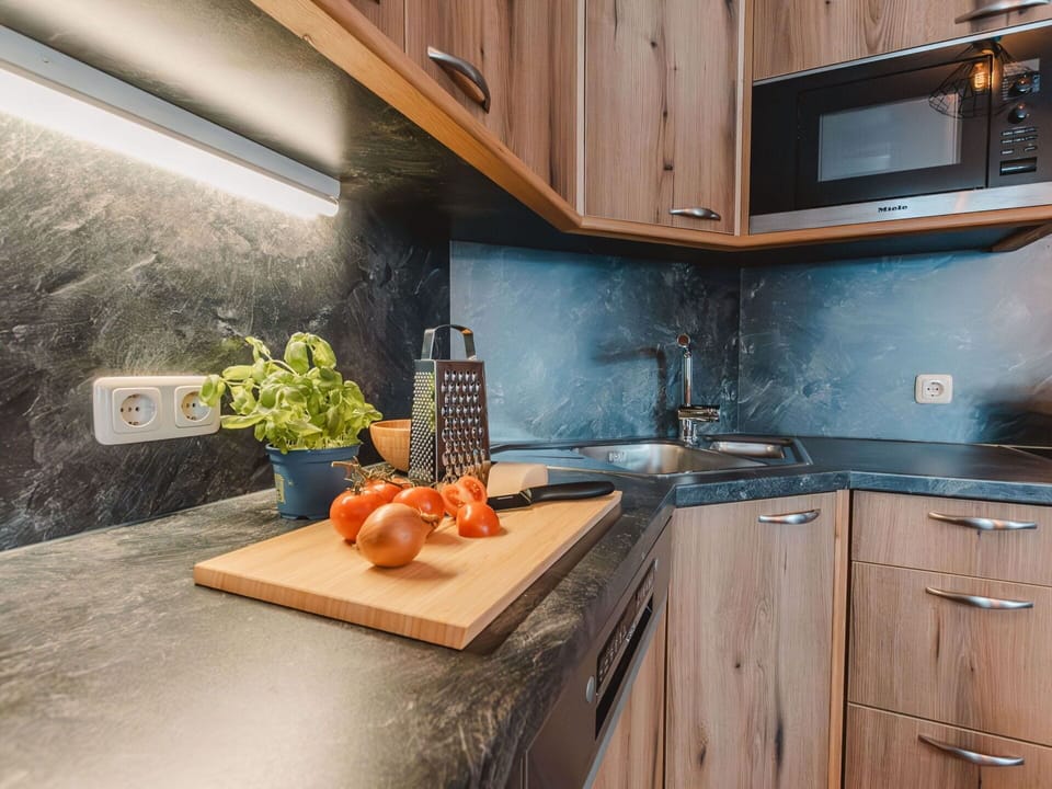 Cabinetry, Countertop, Property, Furniture, Kitchen, Wood, Sink, Interior Design, Lighting, Kitchen Sink