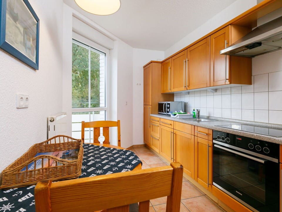 Furniture, Cabinetry, Window, Table, Picture Frame, Countertop, Wood, Interior Design, Kitchen Appliance, Kitchen