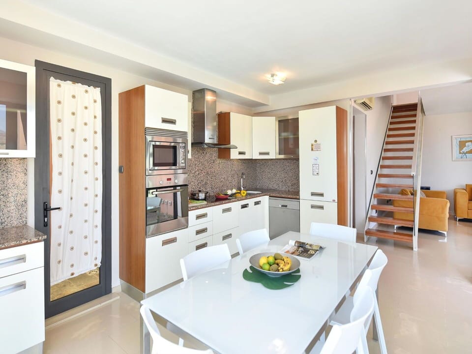Table, Cabinetry, Furniture, Countertop, Interior Design, Wood, Shelving, Home Appliance, Flooring, Living Room