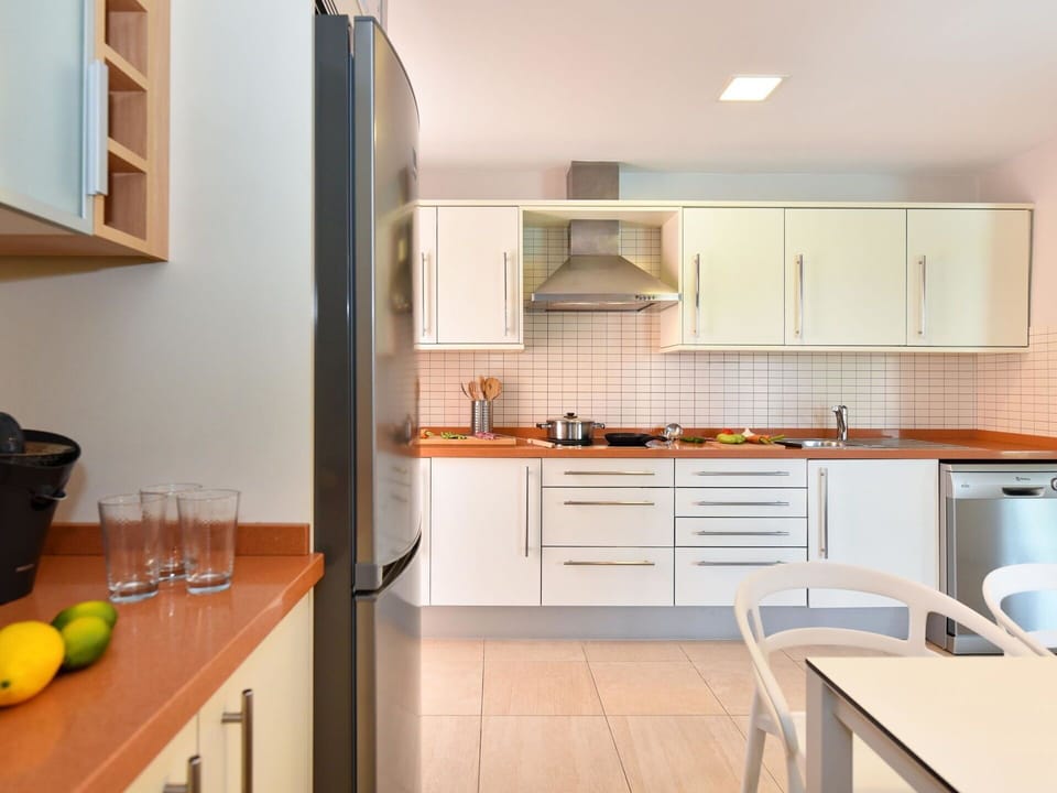 Kitchen Appliance, Kitchen, Countertop, Furniture, Major Appliance, Cabinetry, Interior Design, Flooring, Wood, Home Appliance
