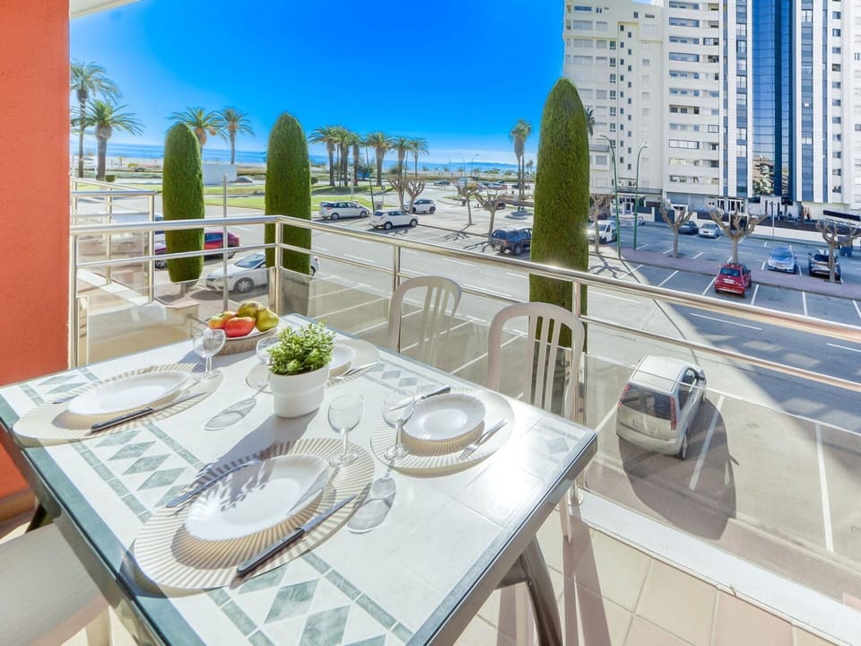 Table, Building, Tableware, Property, Sky, Furniture, Dishware, Interior Design, Flowerpot, Car
