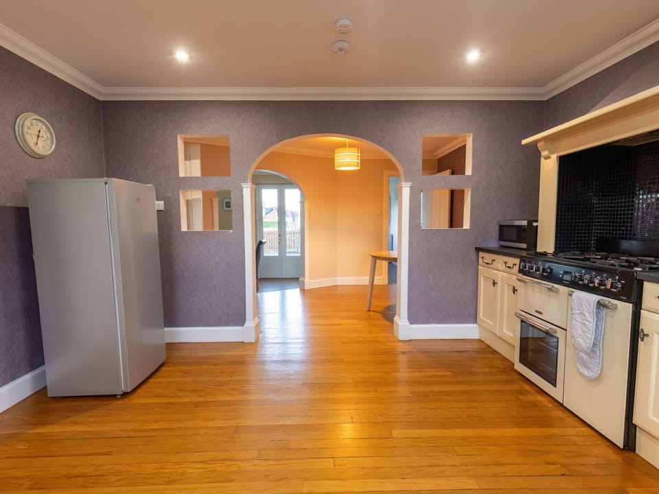 Cabinetry, Building, Countertop, Wood, Kitchen, Lighting, Interior Design, Door, Flooring, Wood Stain
