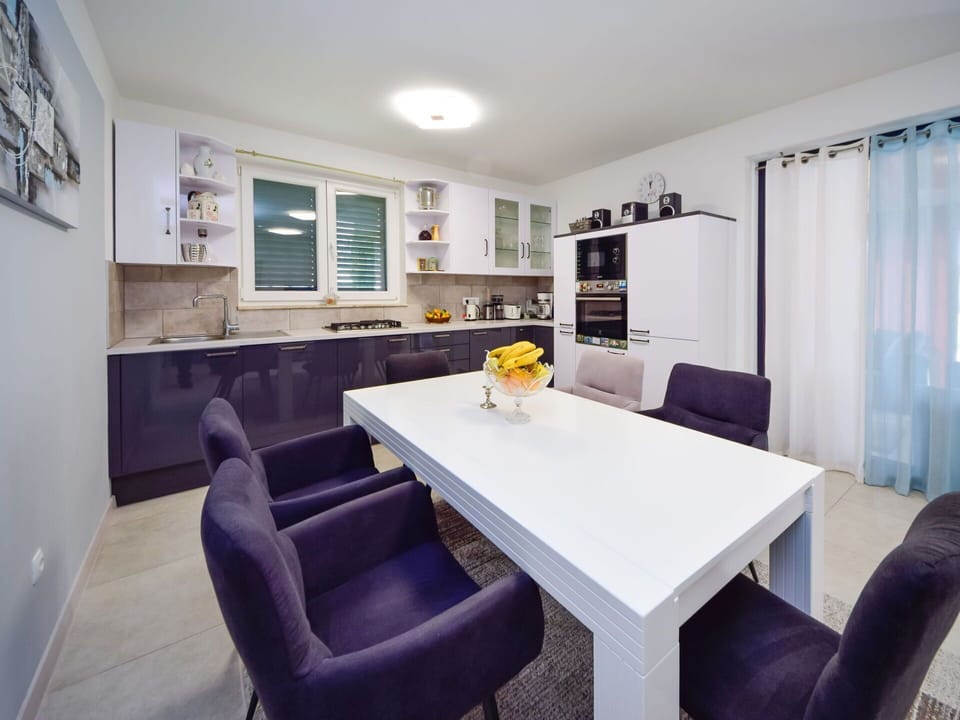 Table, Furniture, Picture Frame, Chair, Building, Couch, Purple, Interior Design, Floor, Living Room