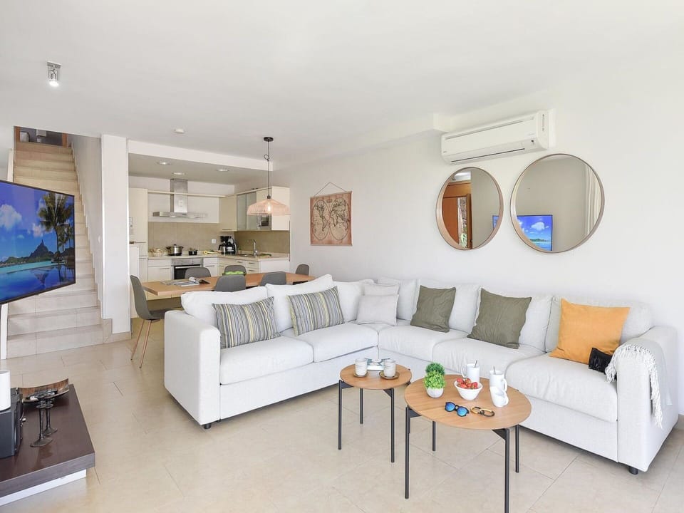 Couch, Furniture, Picture Frame, Table, Interior Design, Living Room, Studio Couch, Shelving, Floor, Shelf