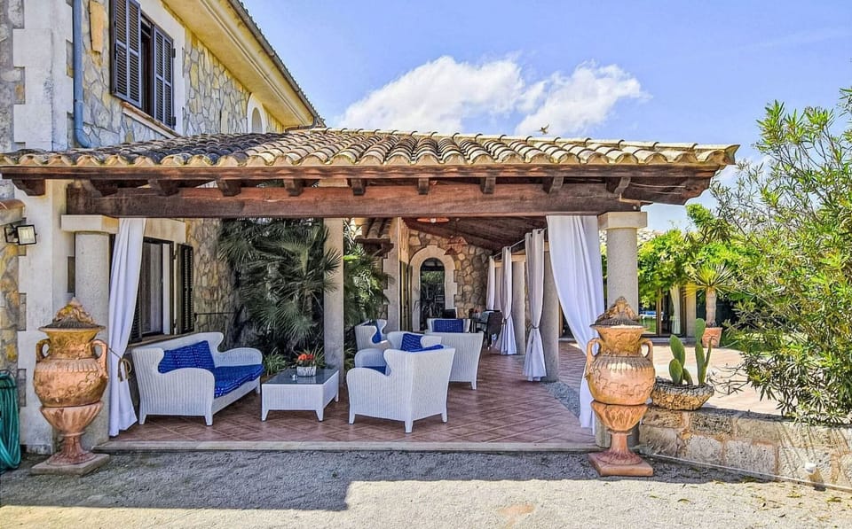 Sky, Plant, Building, Furniture, Cloud, Chair, Azure, Flowerpot, Shade, Table
