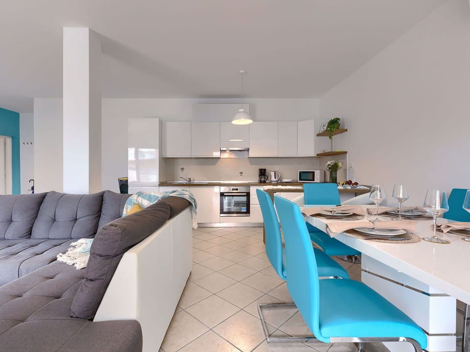 Furniture, Table, Couch, Comfort, Floor, Building, Real Estate, Flooring, Studio Couch, Home Appliance