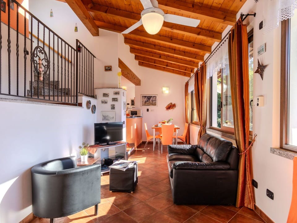 Property, Furniture, Picture Frame, Couch, Wood, Lighting, Interior Design, Architecture, Living Room, Floor