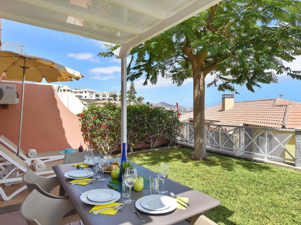 Tableware, Table, Property, Plant, Sky, Azure, Shade, Umbrella, Outdoor Furniture, Chair