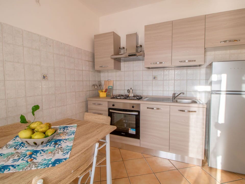 Cabinetry, Property, Furniture, Sink, Kitchen Sink, Countertop, Building, Tap, Kitchen Stove, Kitchen