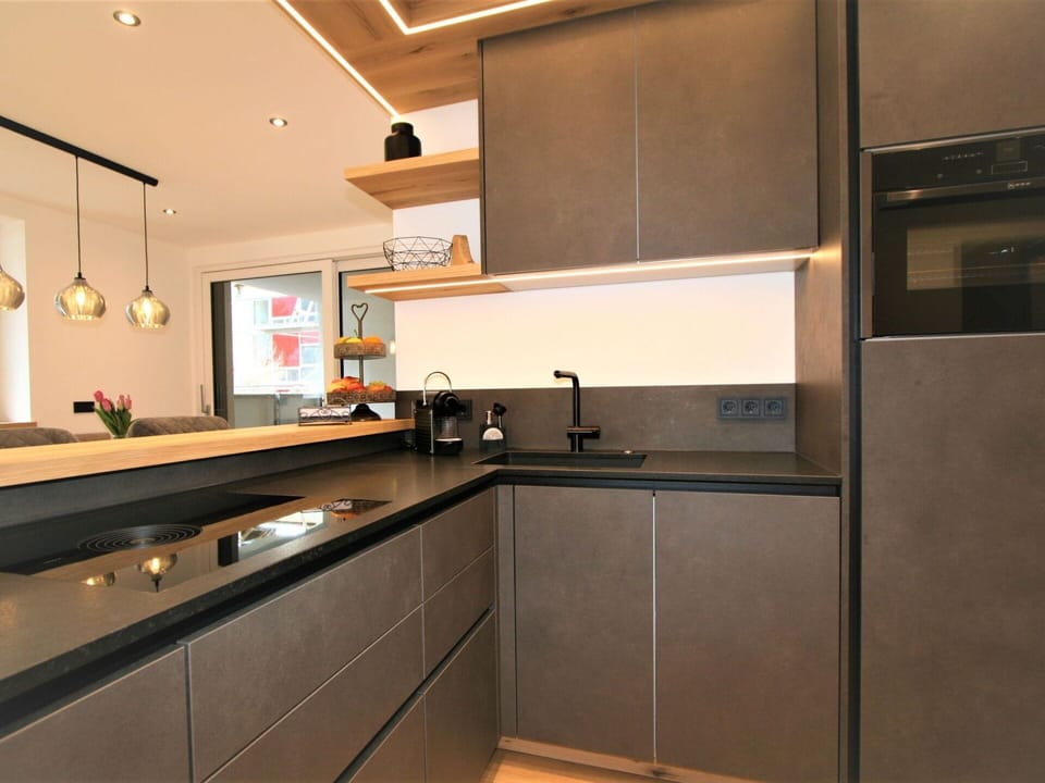 Cabinetry, Countertop, Property, Tap, Sink, Kitchen Stove, Kitchen Appliance, Kitchen, Wood, Building