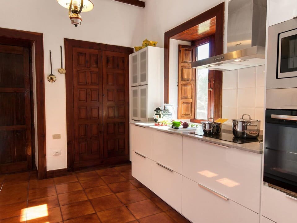 Cabinetry, Property, Countertop, Door, Lighting, Wood, Interior Design, Kitchen Appliance, Floor