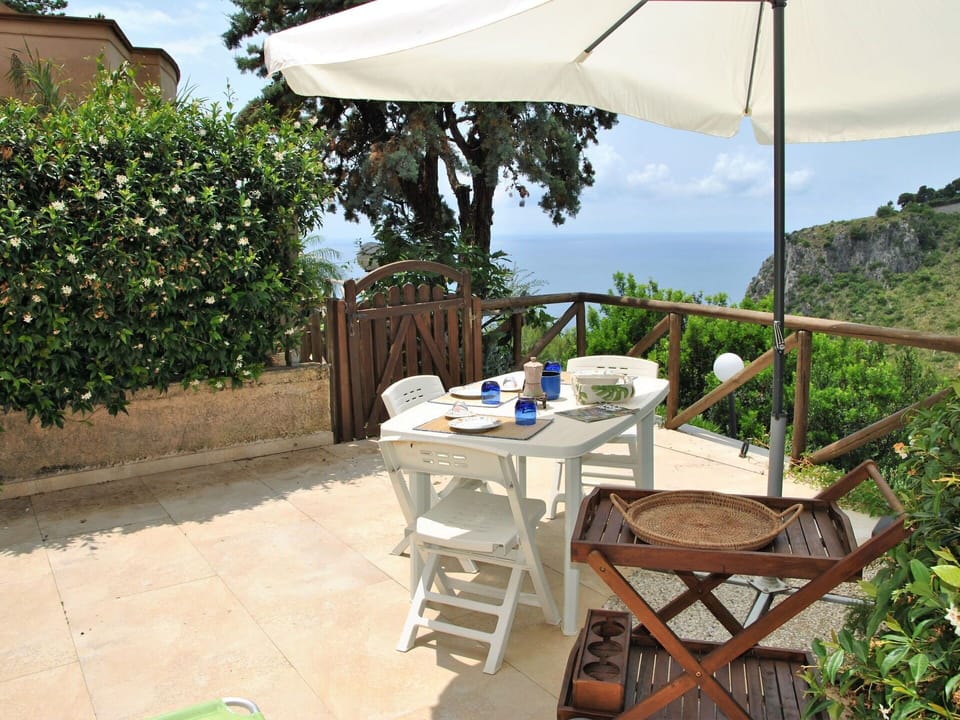 Plant, Table, Furniture, Property, Sky, Outdoor Table, Azure, Botany, Outdoor Furniture, Shade