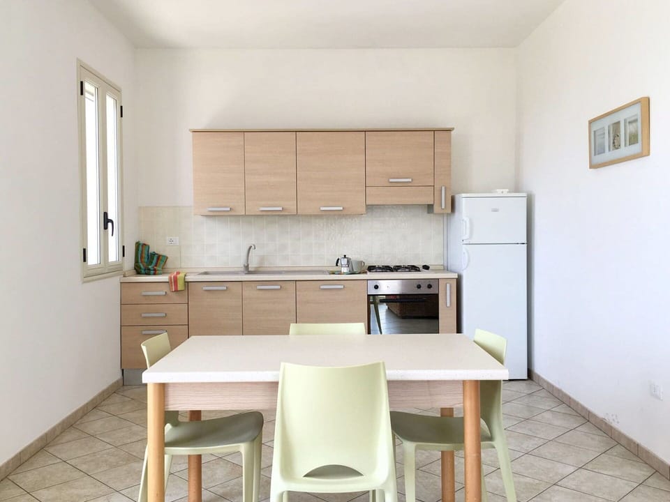 Cabinetry, Furniture, Table, Countertop, Kitchen, Chair, Wood, Interior Design, Flooring, Floor