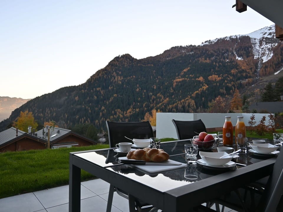 Table, Sky, Furniture, Property, Tableware, Mountain, Food, Outdoor Furniture, Outdoor Table, Interior Design