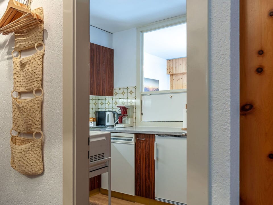 Property, Cabinetry, Building, Wood, Interior Design, Floor, Flooring, Home Appliance, Material Property, Drawer