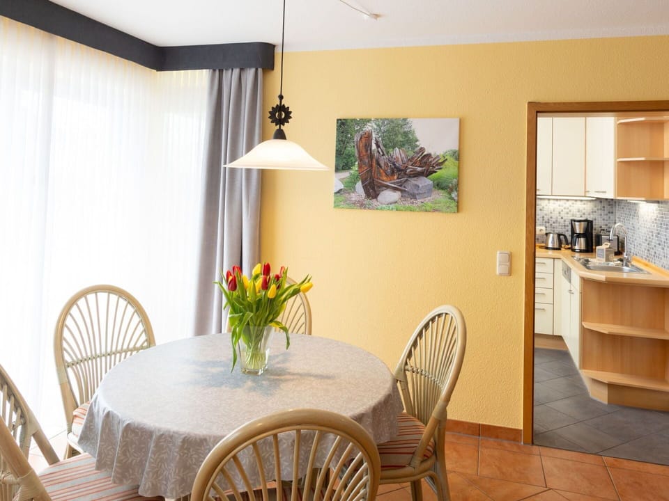 Furniture, Interior Design, Flooring, Wood, Floor, Yellow, Lighting, Table, Room, Chair