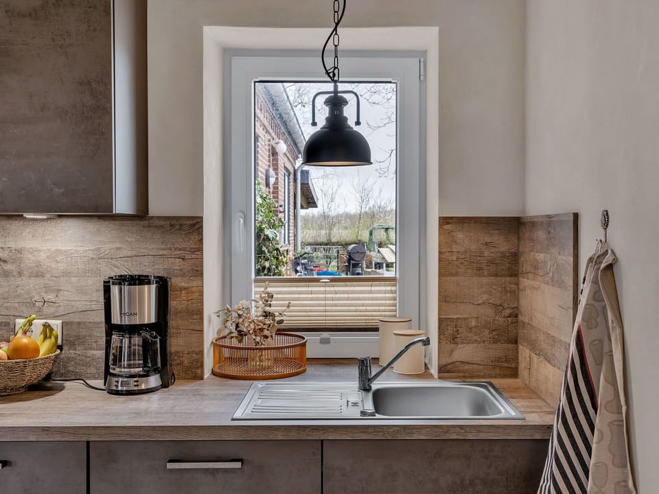 Kitchen, Countertop, Furniture, Wall, Interior Design, Flooring, Wood, Kitchen Appliance, Floor, Home Appliance