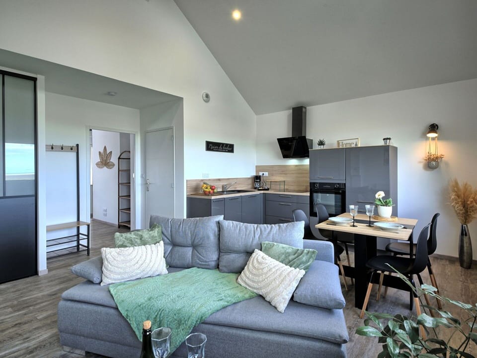 Couch, Property, Furniture, Table, Living Room, Lighting, Picture Frame, Interior Design, Comfort