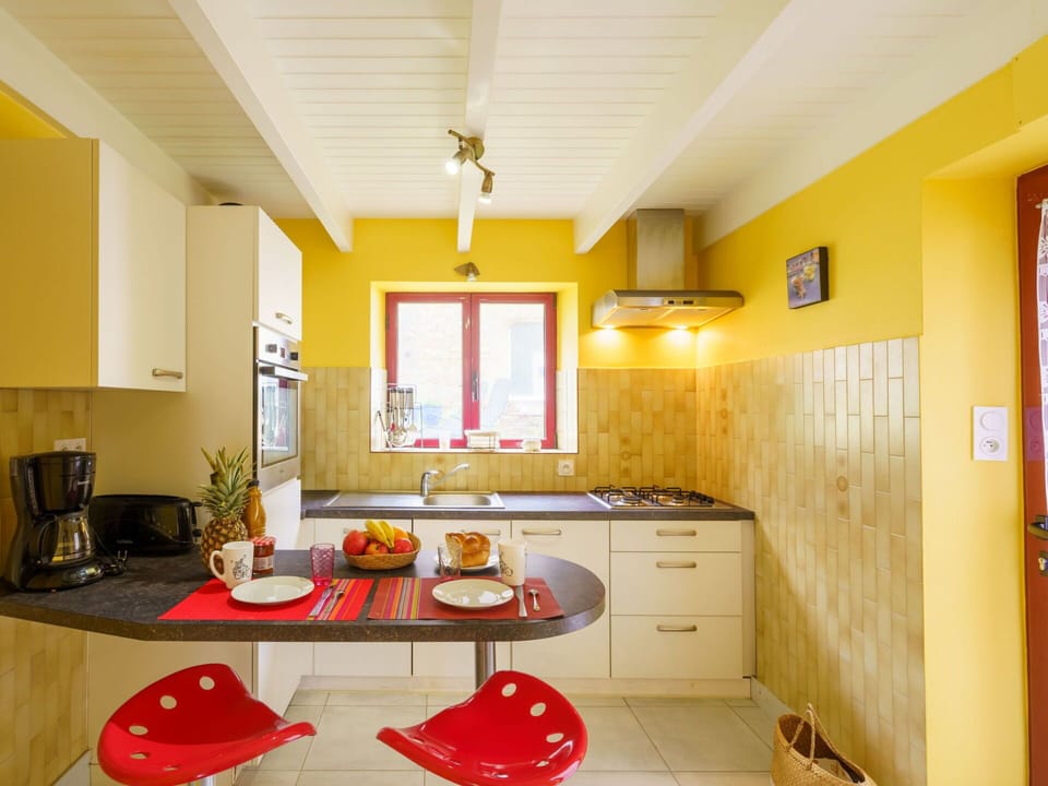 Cabinetry, Property, Countertop, Table, Window, Building, Interior Design, Kitchen, Wood, Orange