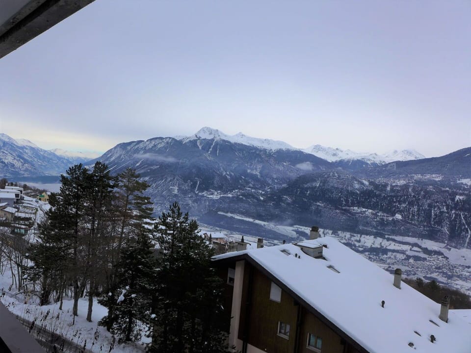 Sky, Daytime, Mountain, Snow, Cloud, Nature, Slope, Highland, Window, Tree
