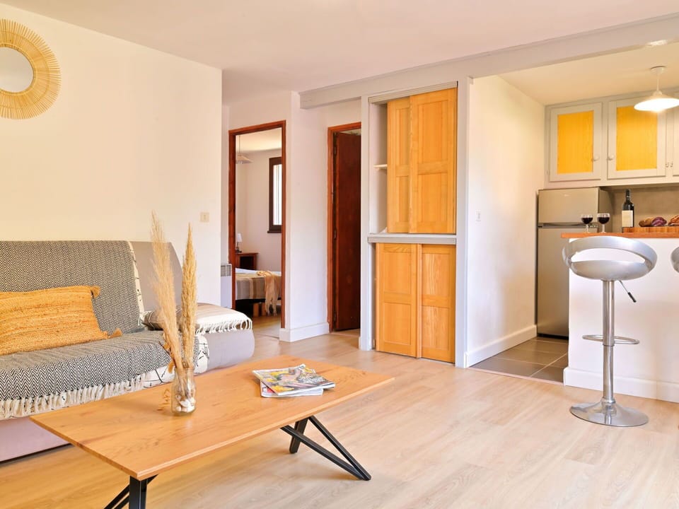 Furniture, Property, Interior Design, Comfort, Wood, Table, Cabinetry, Orange, Flooring, Yellow