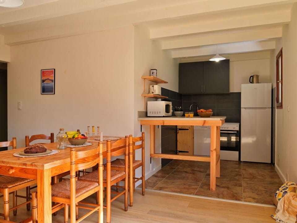 Table, Furniture, Cabinetry, Kitchen, Countertop, Orange, Wood, Chair, Wood Stain, Floor