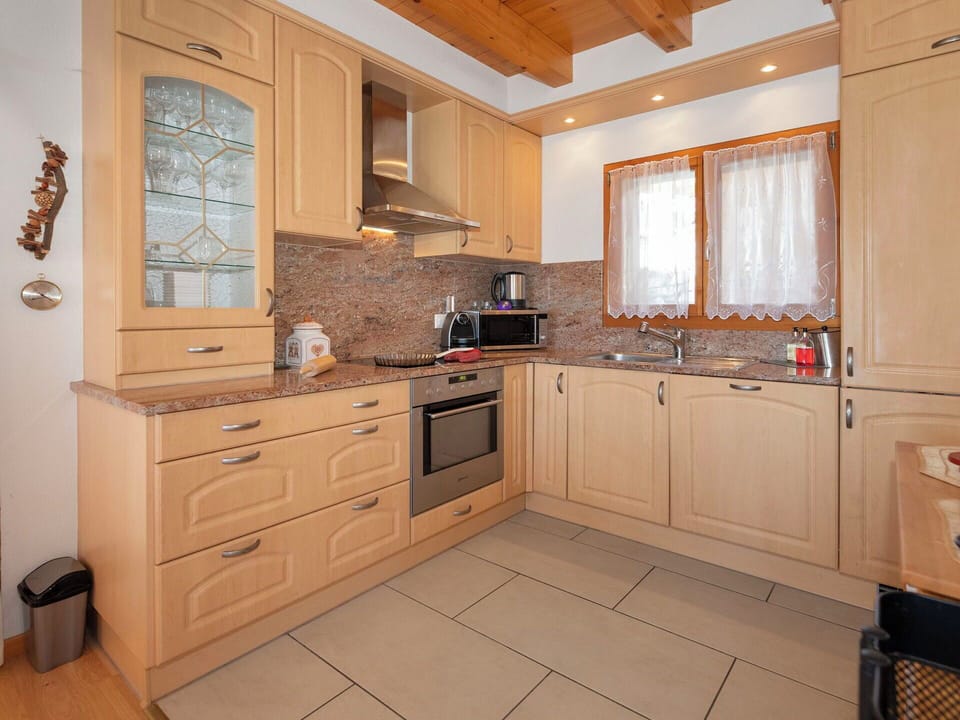 Kitchen, Cabinetry, Countertop, Kitchen Appliance, Furniture, Flooring, Wood, Interior Design, Major Appliance, Drawer