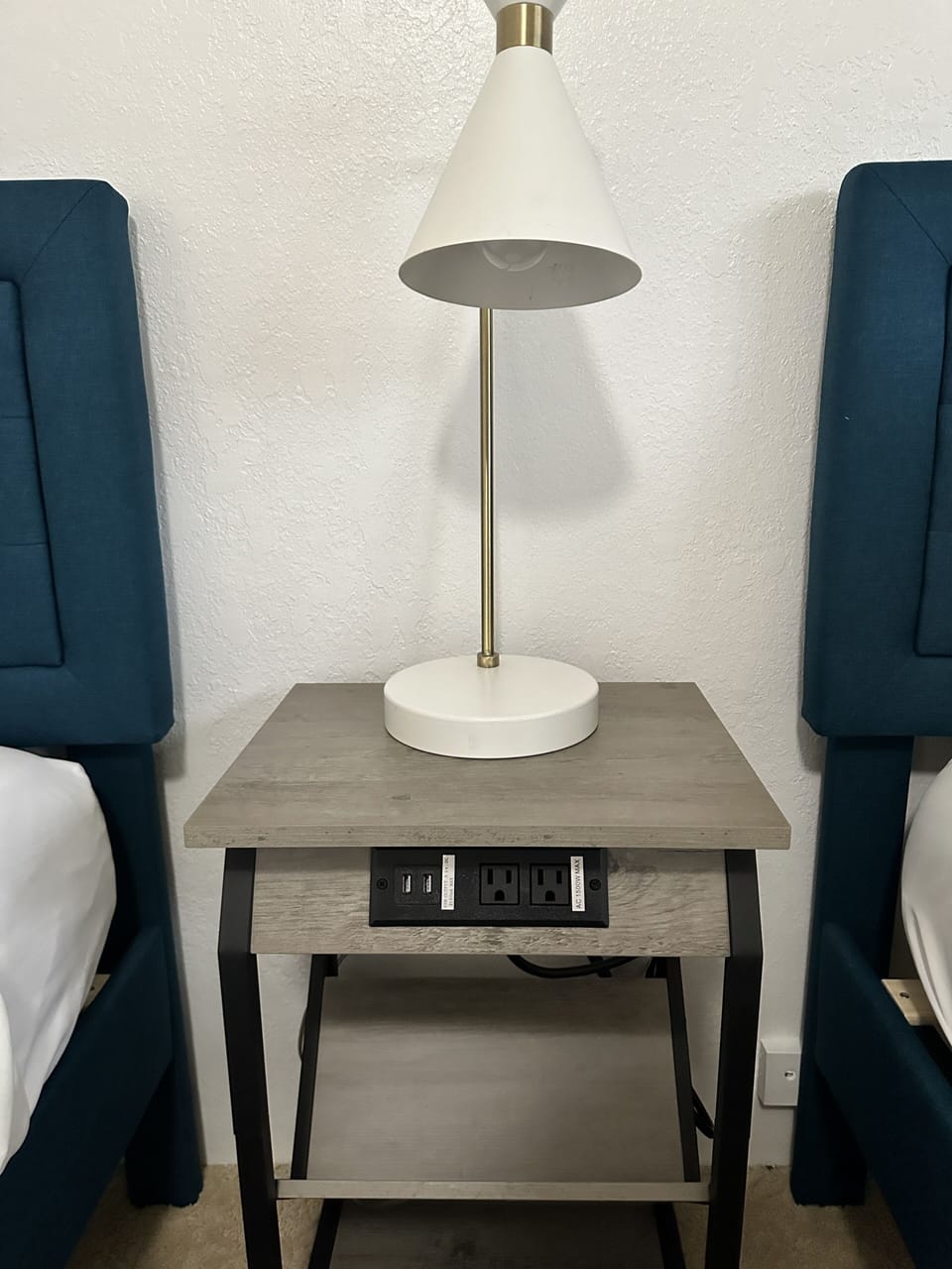 Nightstand with power outlets/charging. (in all bedrooms)