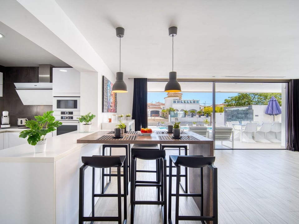 Furniture, Kitchen, Interior Design, Countertop, Flooring, Chair, Light Fixture, Kitchen & Dining Room Table, Table, Ceiling