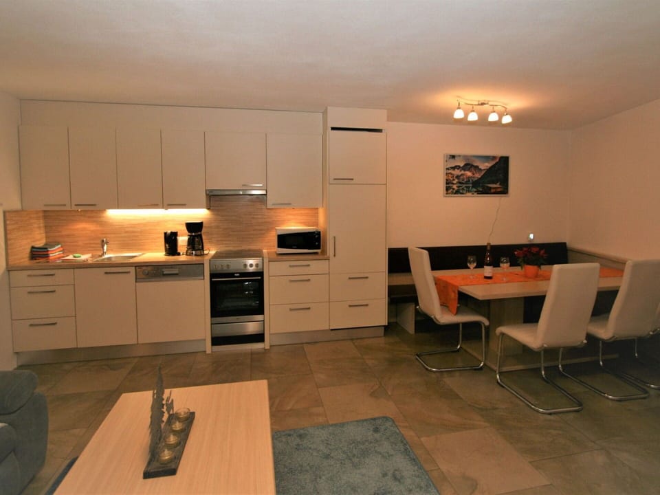 Cabinetry, Furniture, Property, Table, Countertop, Building, Kitchen Stove, Drawer, Wood, Kitchen Appliance