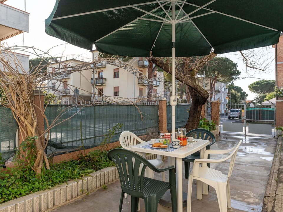 Table, Plant, Furniture, Building, Chair, Outdoor Table, Shade, Outdoor Furniture, Tree, Leisure