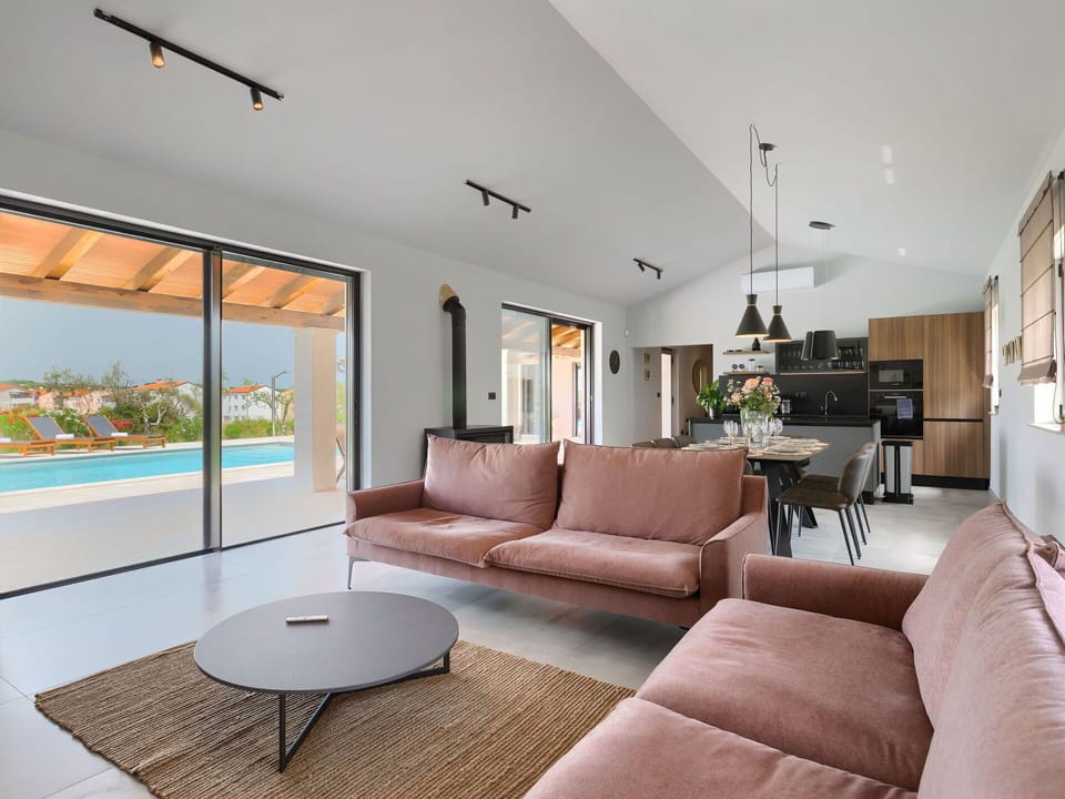 Furniture, Property, Couch, Table, Plant, Interior Design, Lighting, Comfort, Houseplant, Orange