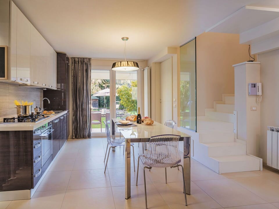 Furniture, Table, Cabinetry, Countertop, Wood, Interior Design, Kitchen, Flooring, Chair, Floor