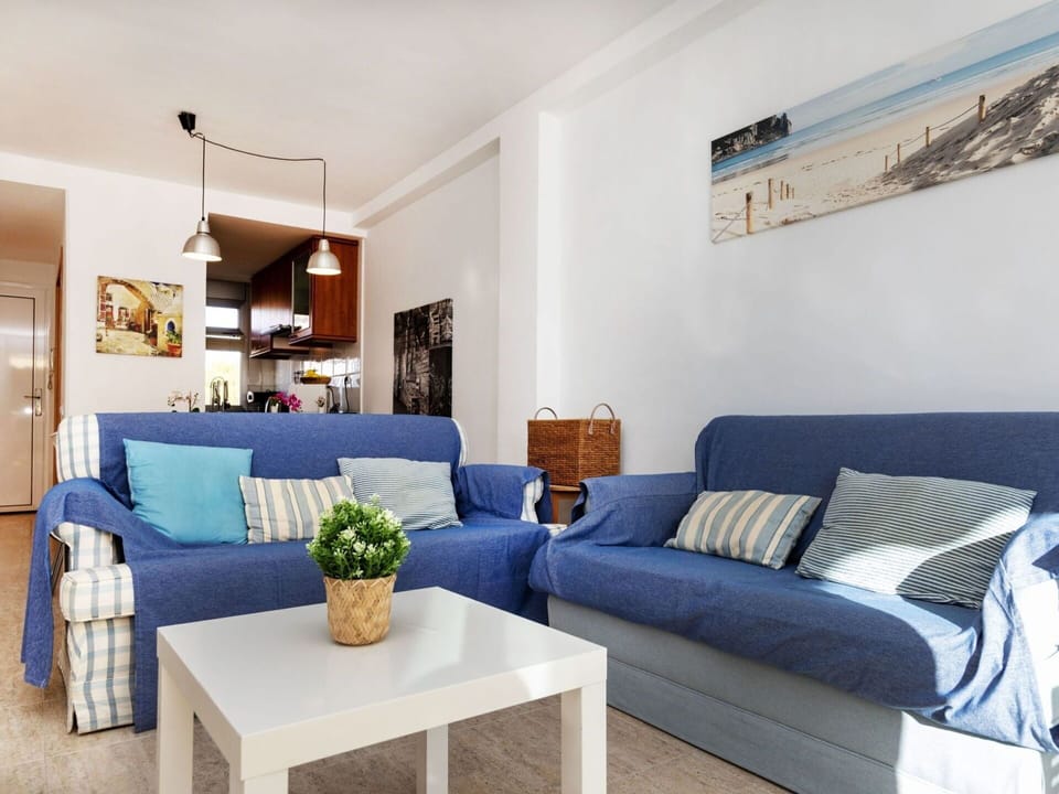 Furniture, Table, Couch, Picture Frame, Property, Blue, Azure, Interior Design, Comfort, Studio Couch