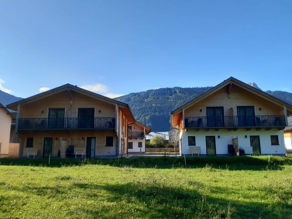 Sky, Plant, Building, Window, Mountain, House, Tree, Cloud, Land Lot, Porch