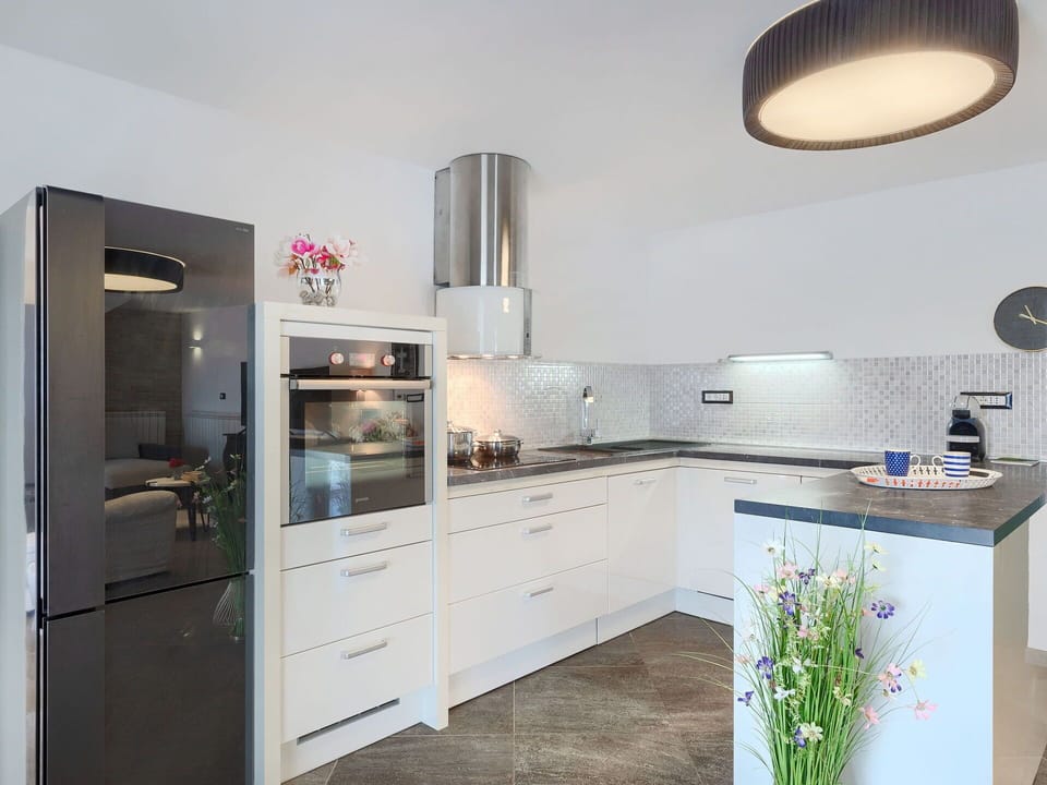 Cabinetry, Countertop, Furniture, Kitchen Stove, Kitchen, Drawer, Interior Design, Exhaust Hood, Kitchen Appliance, Wood