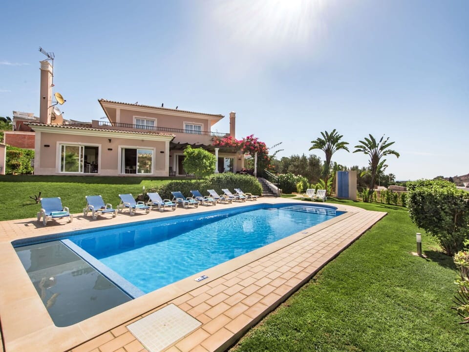 Water, Plant, Sky, Property, Swimming Pool, Azure, Tree, Grass, Leisure, Building