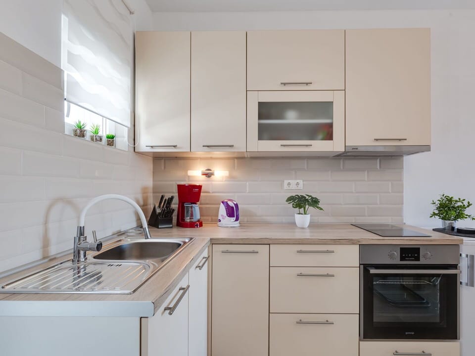 Cabinetry, Kitchen Sink, Countertop, Sink, Property, Building, White, Tap, Product, Interior Design