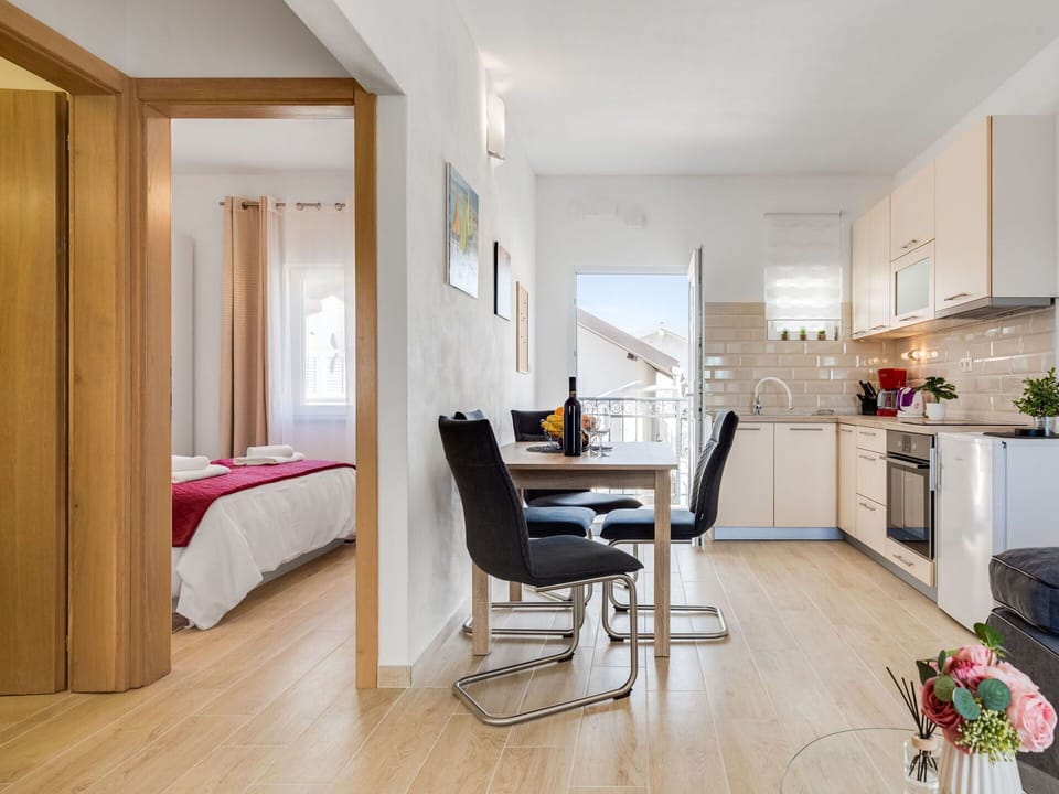 Furniture, Property, Plant, Table, Chair, Cabinetry, Wood, Houseplant, Comfort, Interior Design
