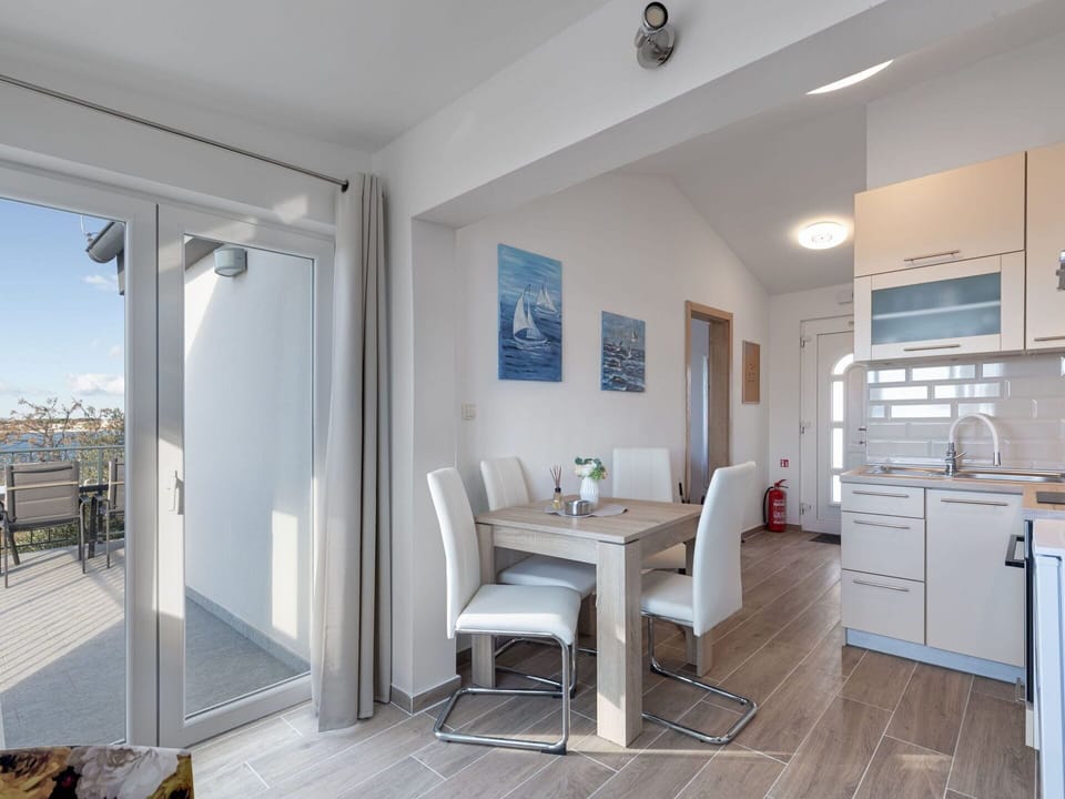 Property, Furniture, Cabinetry, Building, Chair, Table, Interior Design, Lighting, Wood